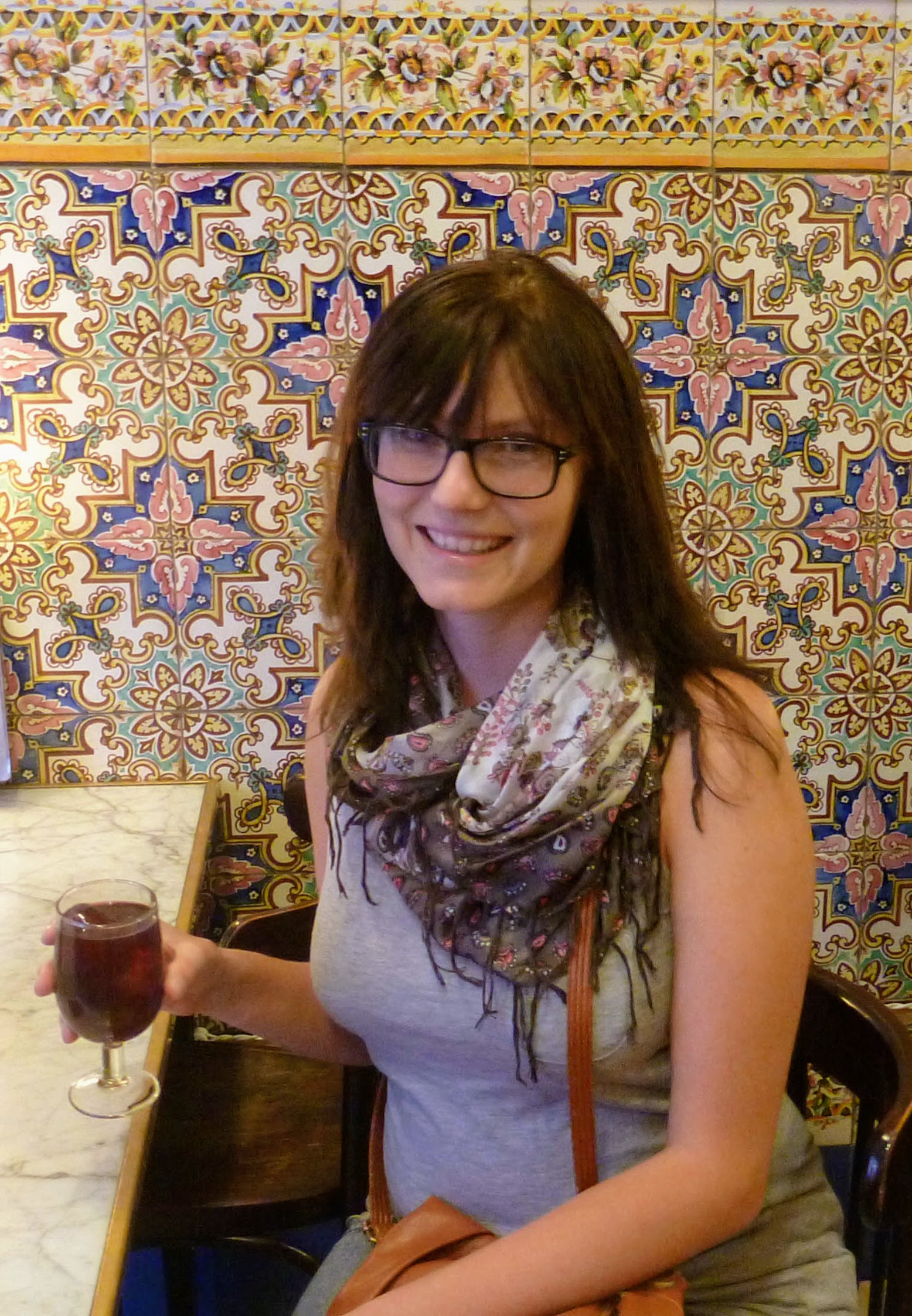 picture of Sam in a cafe drinking sangria