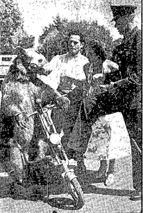 An escaped circus bear on a motorcycle.